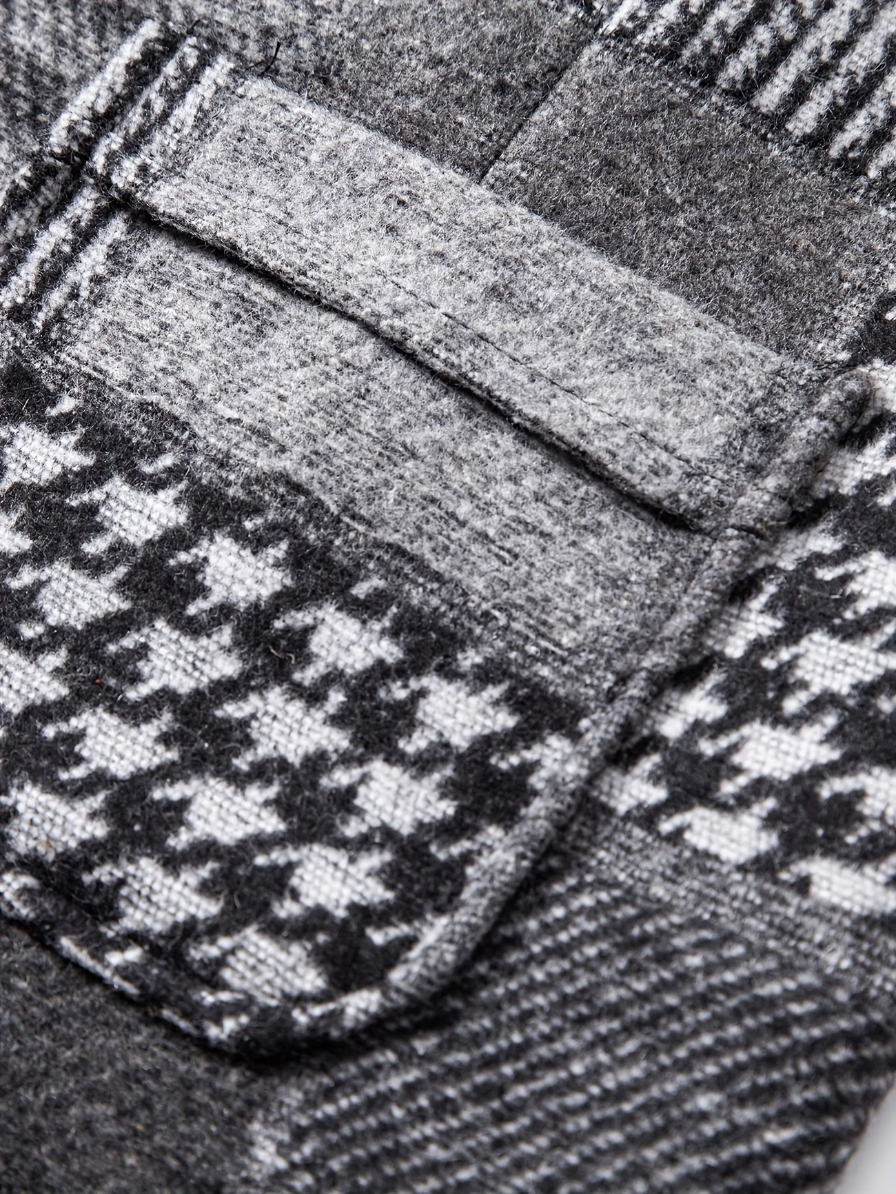 Leo | Chaleco de tweed patchwork con patrón de espiga